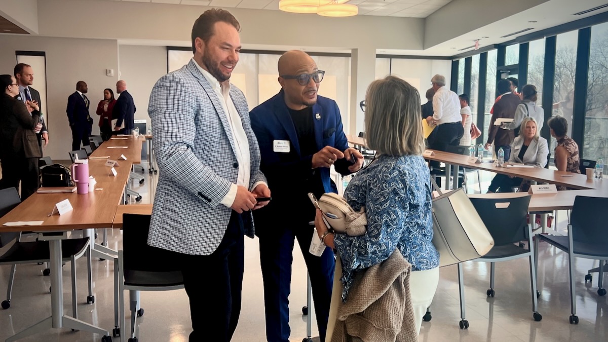 D. Rashaan Gilmore, president and CEO of BlaqOut, with Ryan Hudnall, executive director of Della Lamb, and Stacy Mayer, CEO of Seton Center, after a March 20 roundtable discussion about Medicaid cuts.