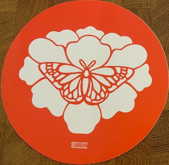 A Monarch Pledge sticker.