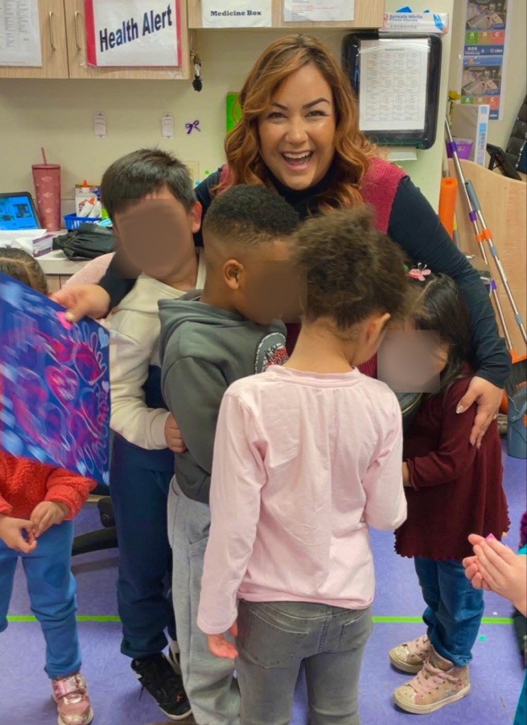Early childhood teacher Karina Valtierra in a classroom with students.