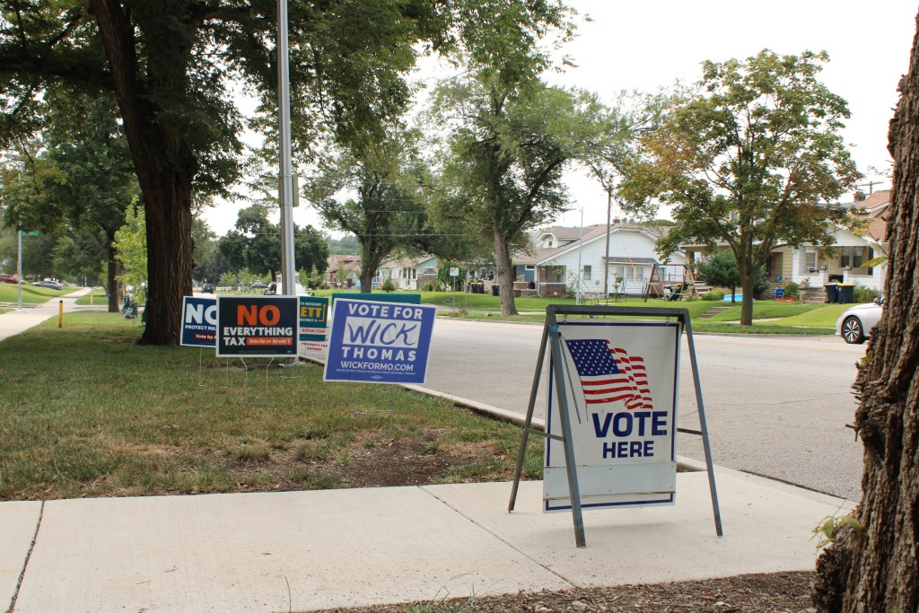 Campaign signs outside of Northeast High School greeted voters as they walked in to vote during the Aug. 4 primaries.